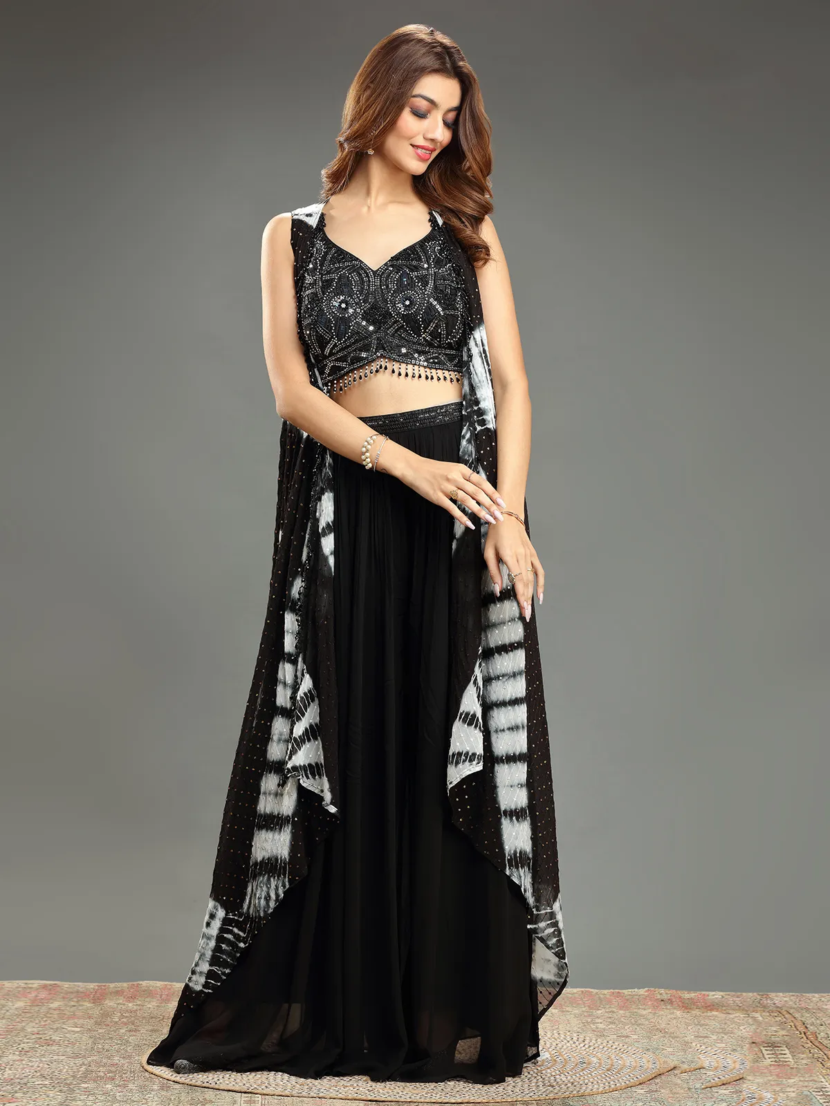 Latest black georgette lehenga suit with shrug