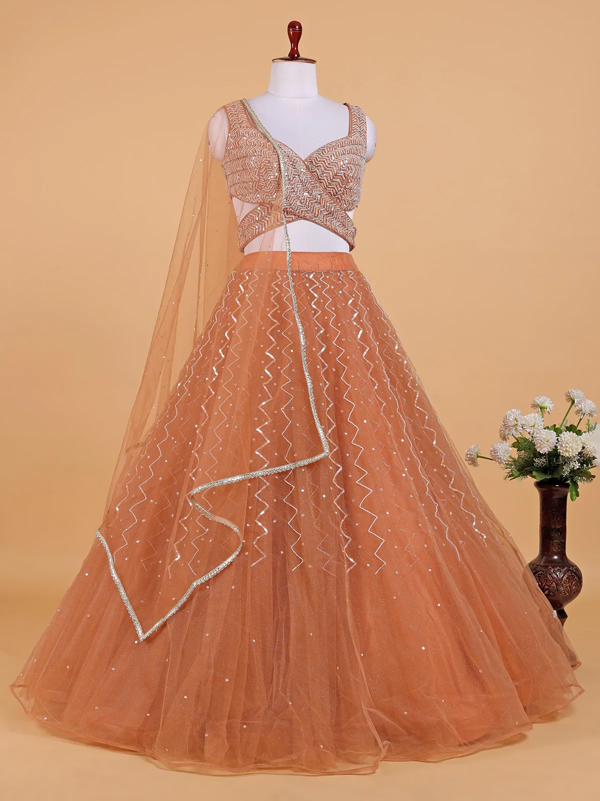 Latest orange net lehenga choli