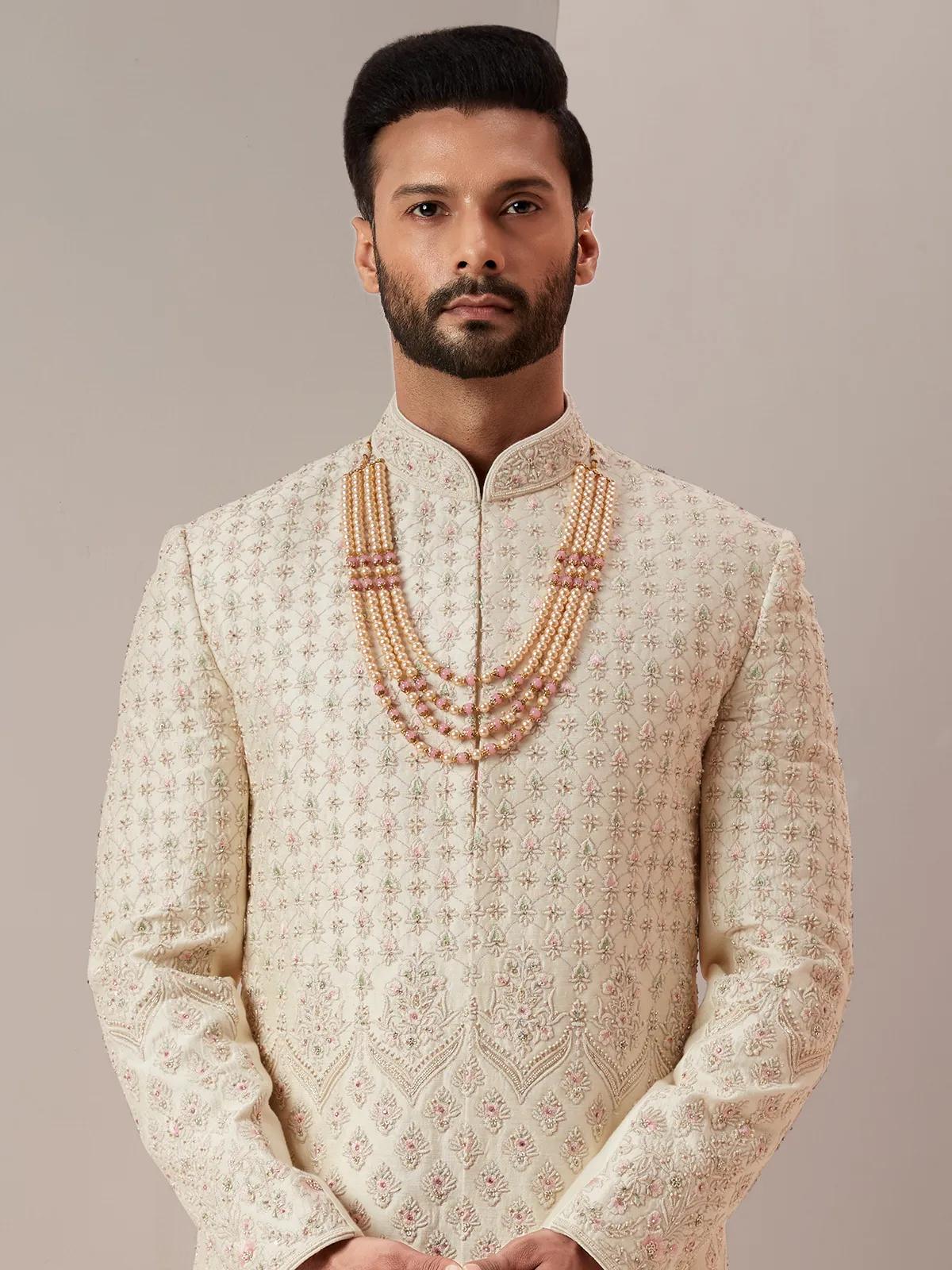 Lavish groom and wedding raw silk sherwani in peach