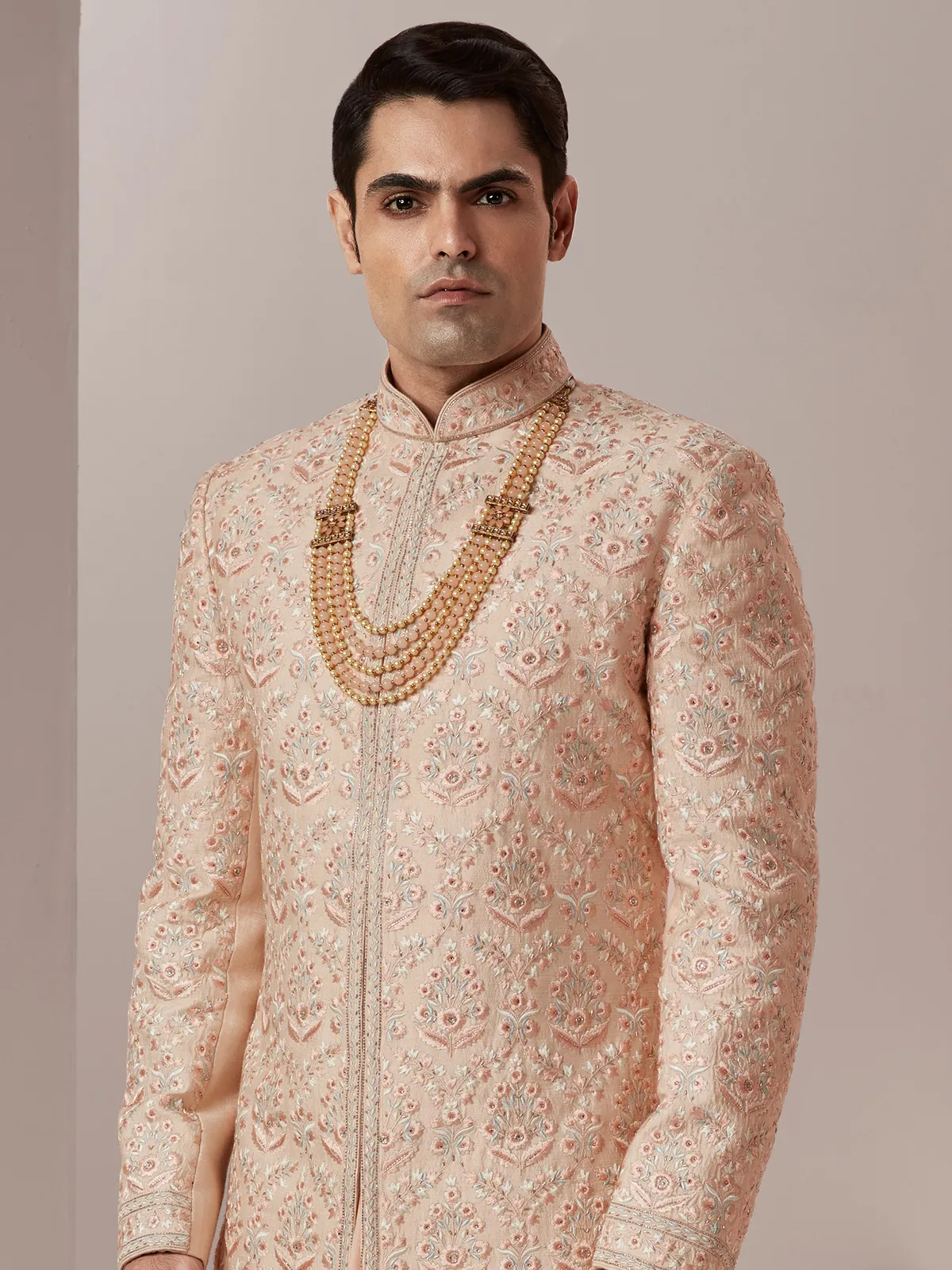 Lavish groom wear raw silk sherwani in peach