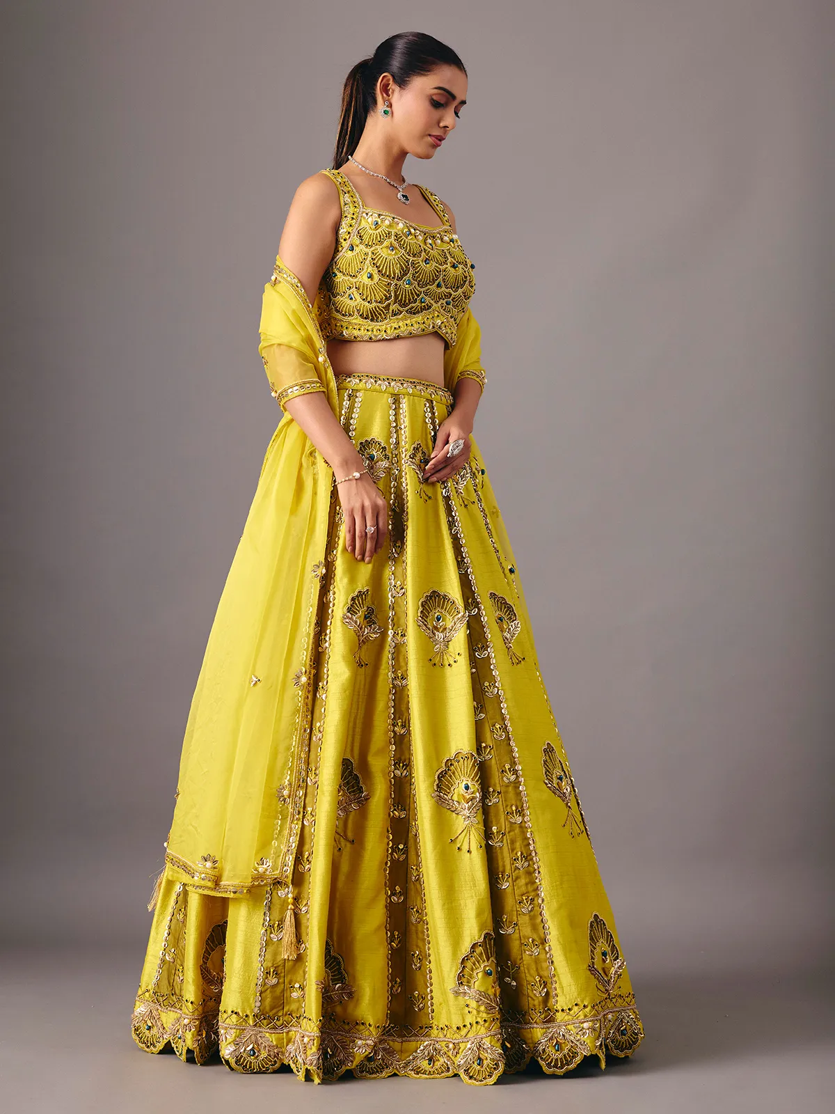 Lemon yellow raw silk lehenga choli with pearl embellishments
