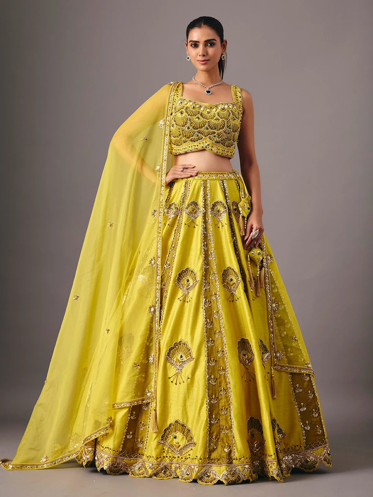 Lemon yellow raw silk lehenga choli with pearl embellishments