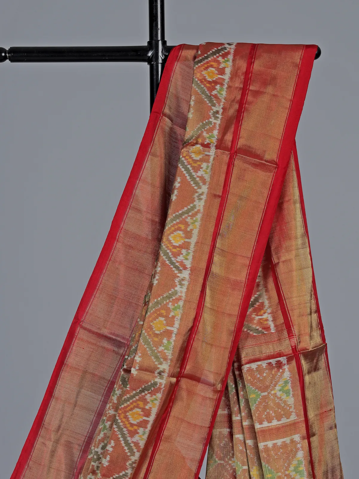 Light brown hyderabadi patola silk saree with heritage motifs