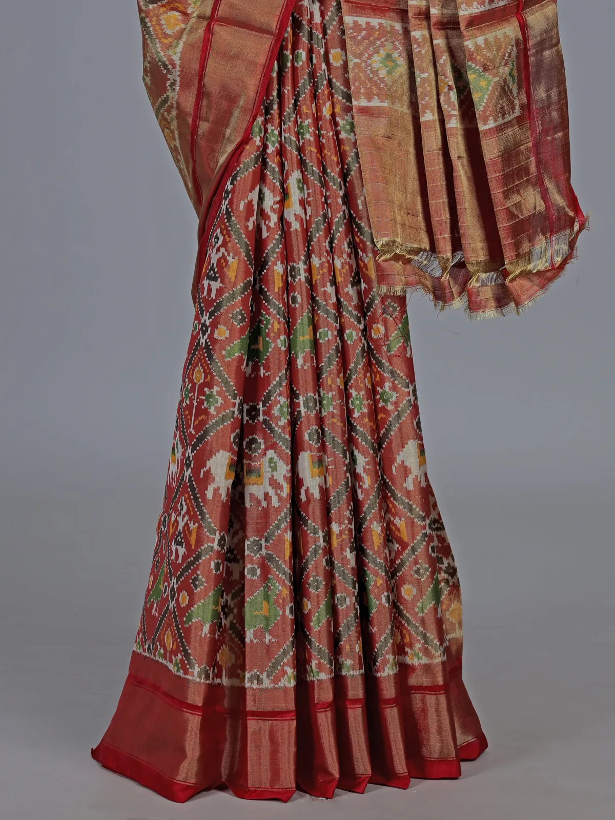 Light brown hyderabadi patola silk saree with heritage motifs
