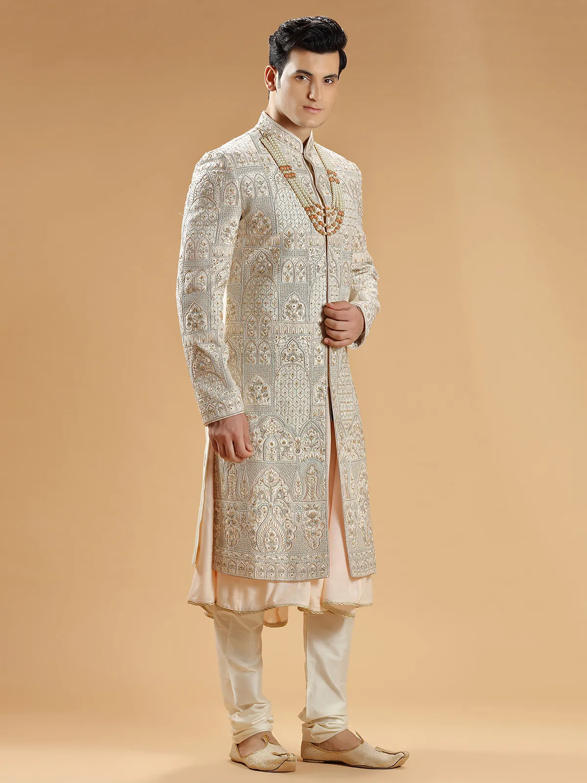 Light peach rich raw silk groom sherwani