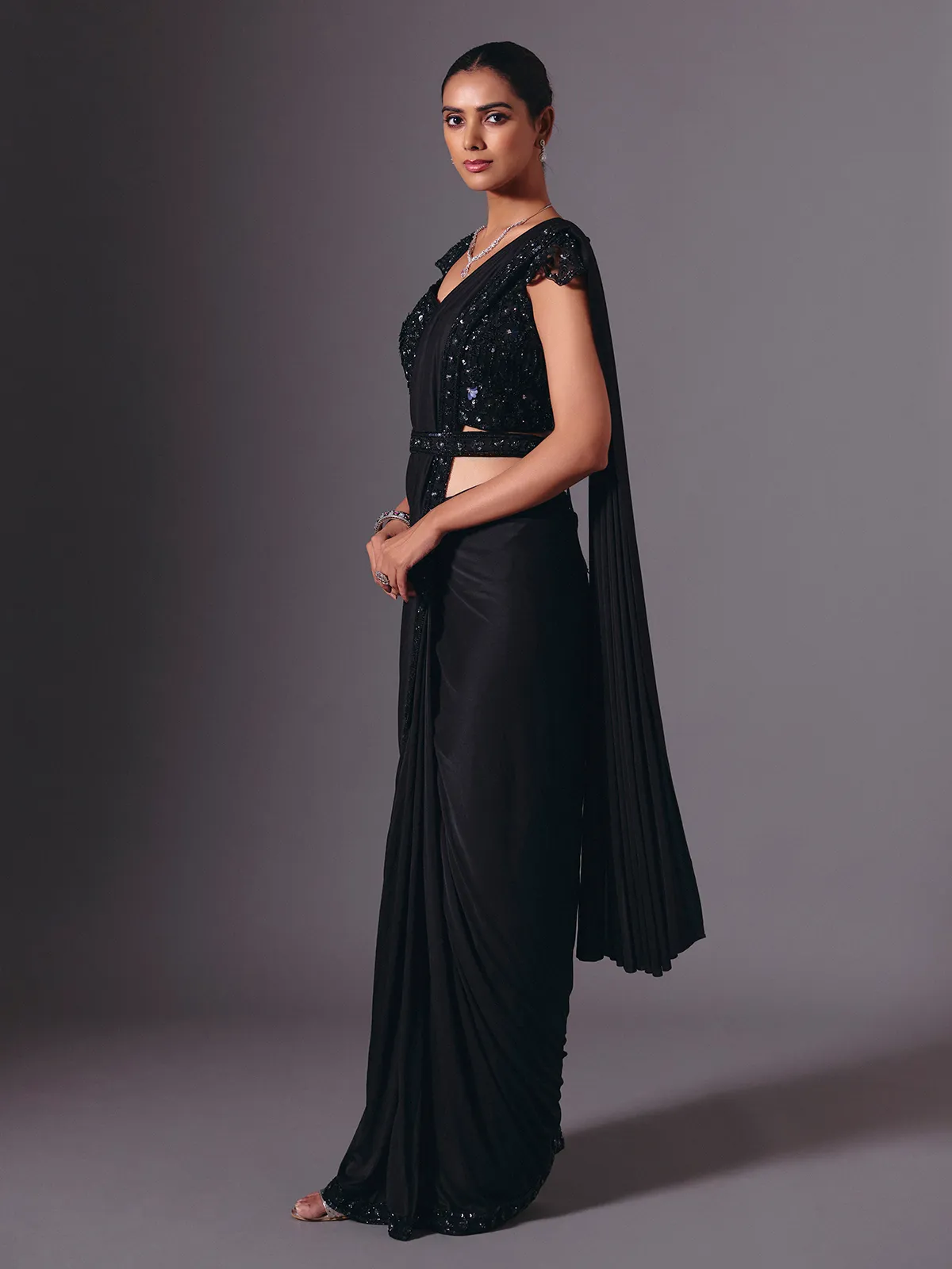 Luxe black lycra saree with diamond and cutdana accents