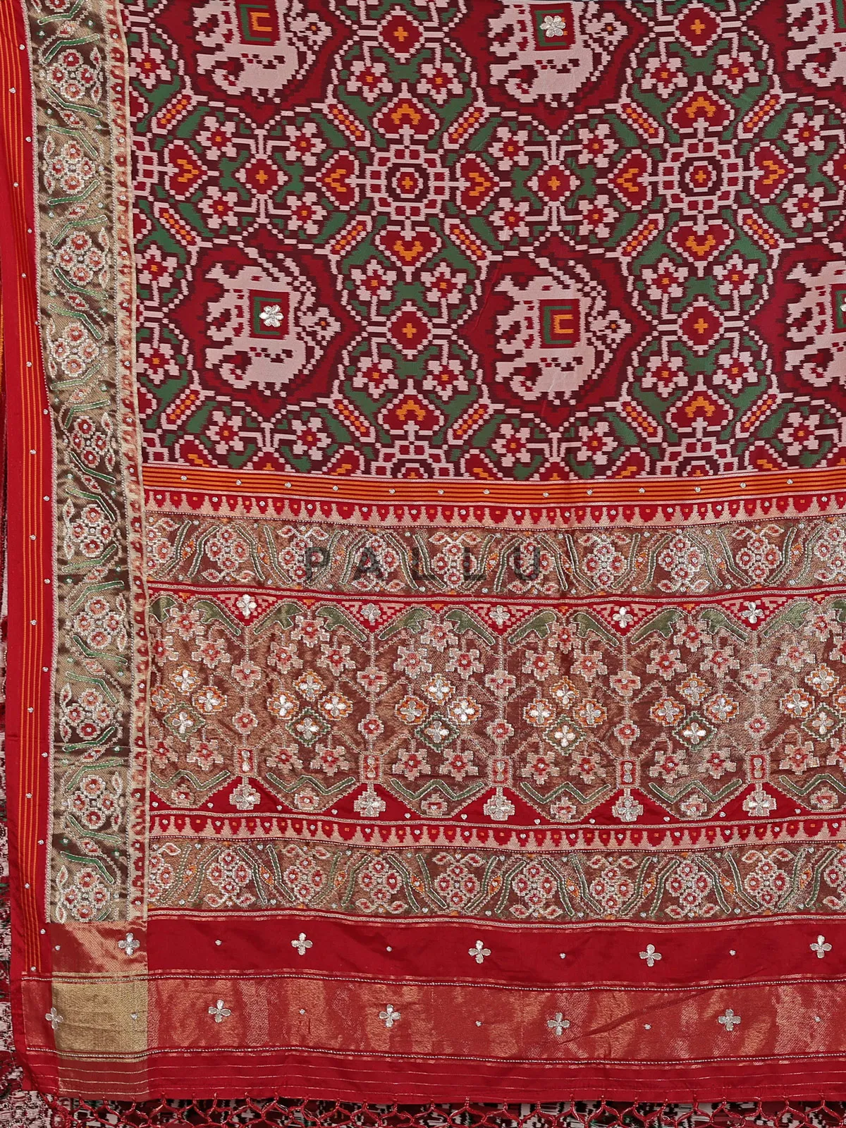 Maroon and green art patola silk saree with motifs