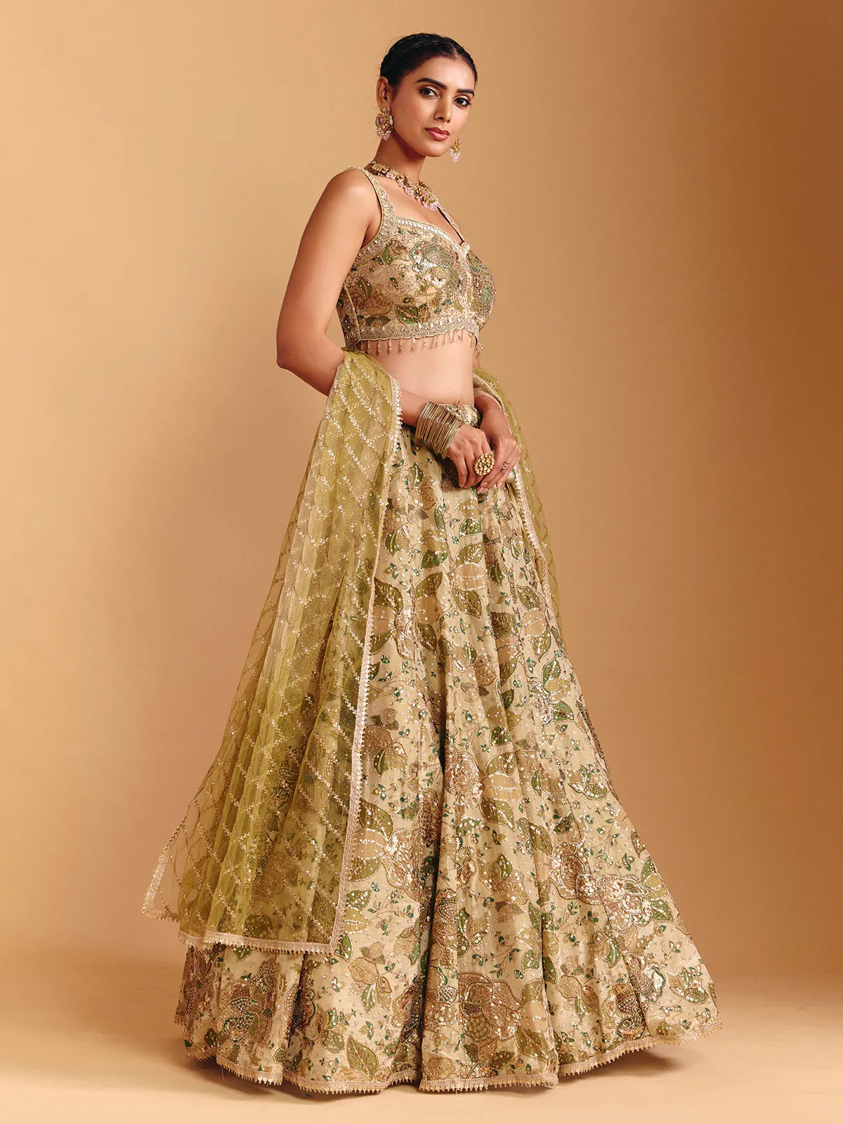 Mehendi green silk lehenga choli with sequin embellishments