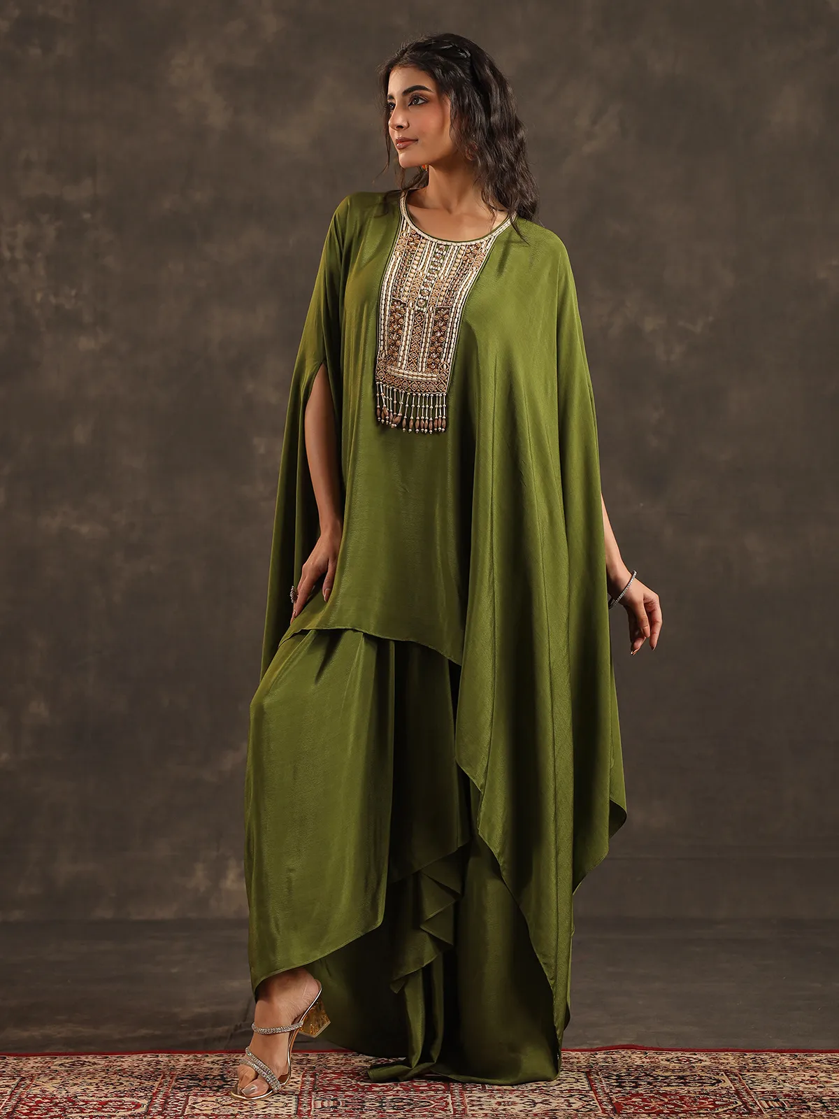 Mehendi green viscose crepe kaftan suit with festive embellishments
