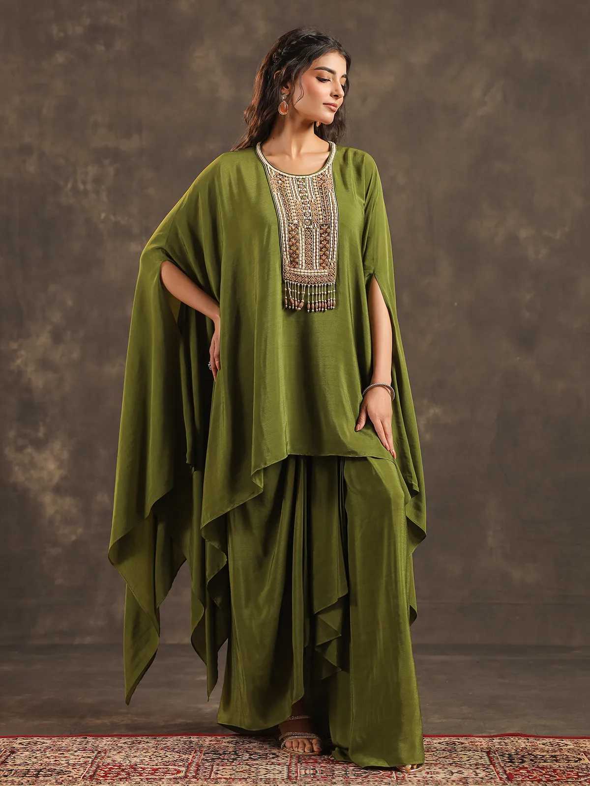 Mehendi green viscose crepe kaftan suit with festive embellishments