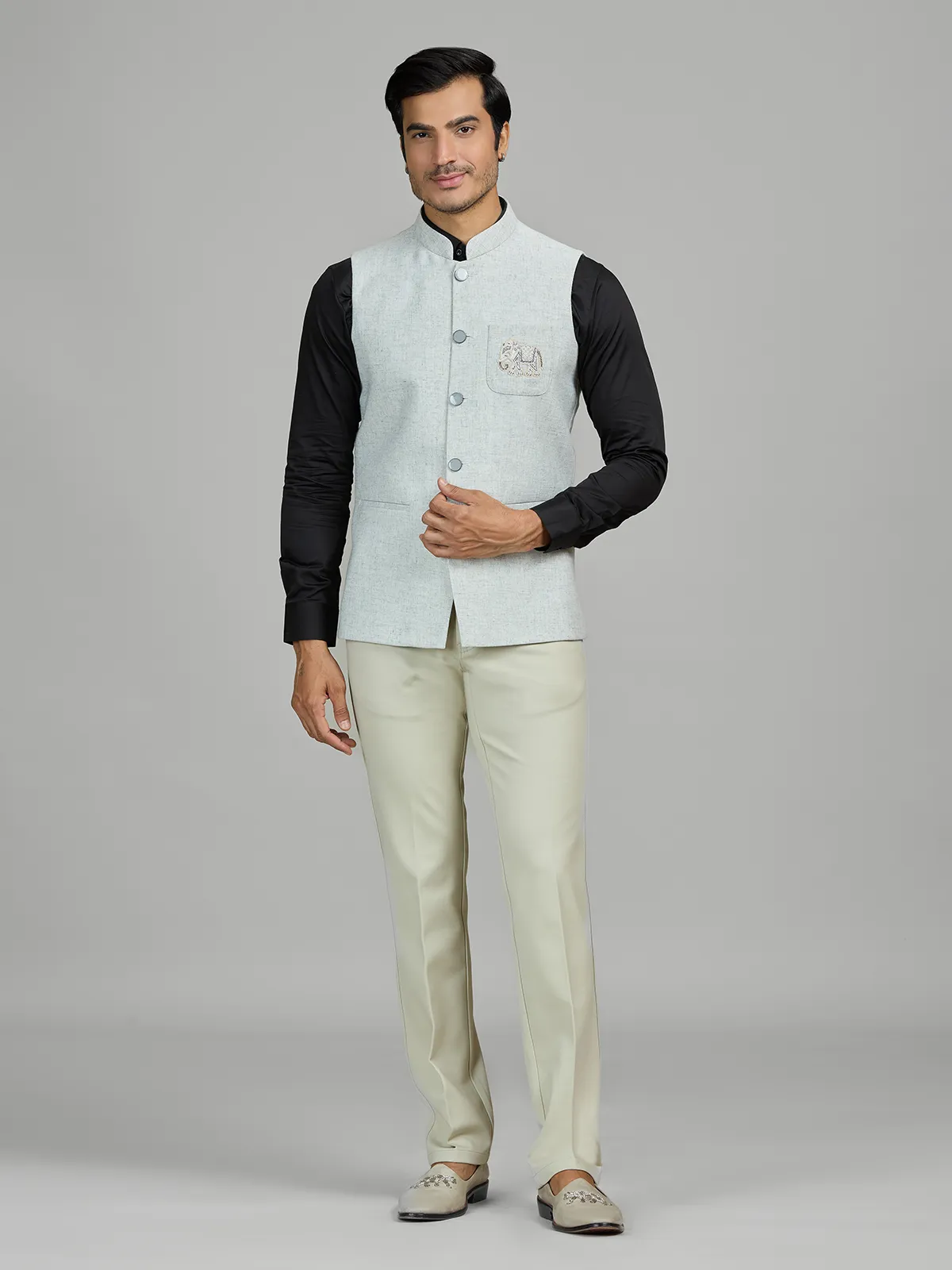 Mint blue linen wedding waistcoat with embellished pocket