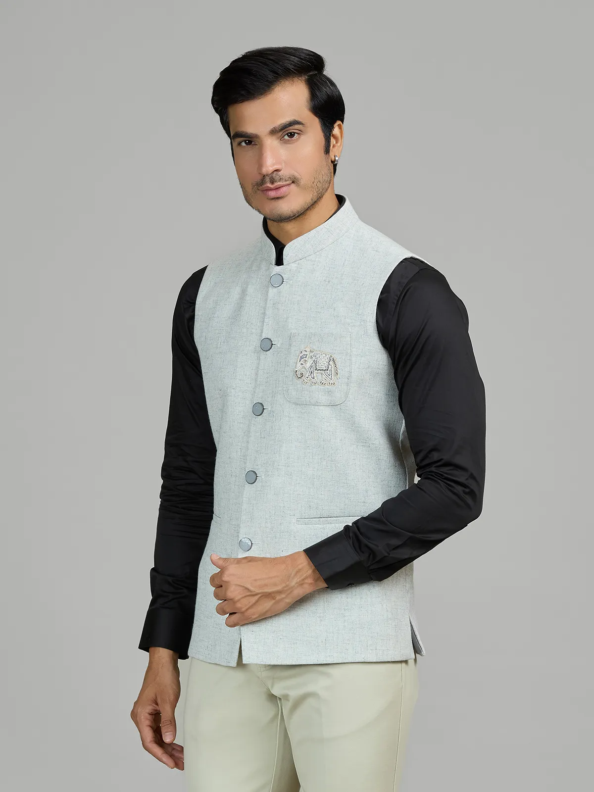 Mint blue linen wedding waistcoat with embellished pocket