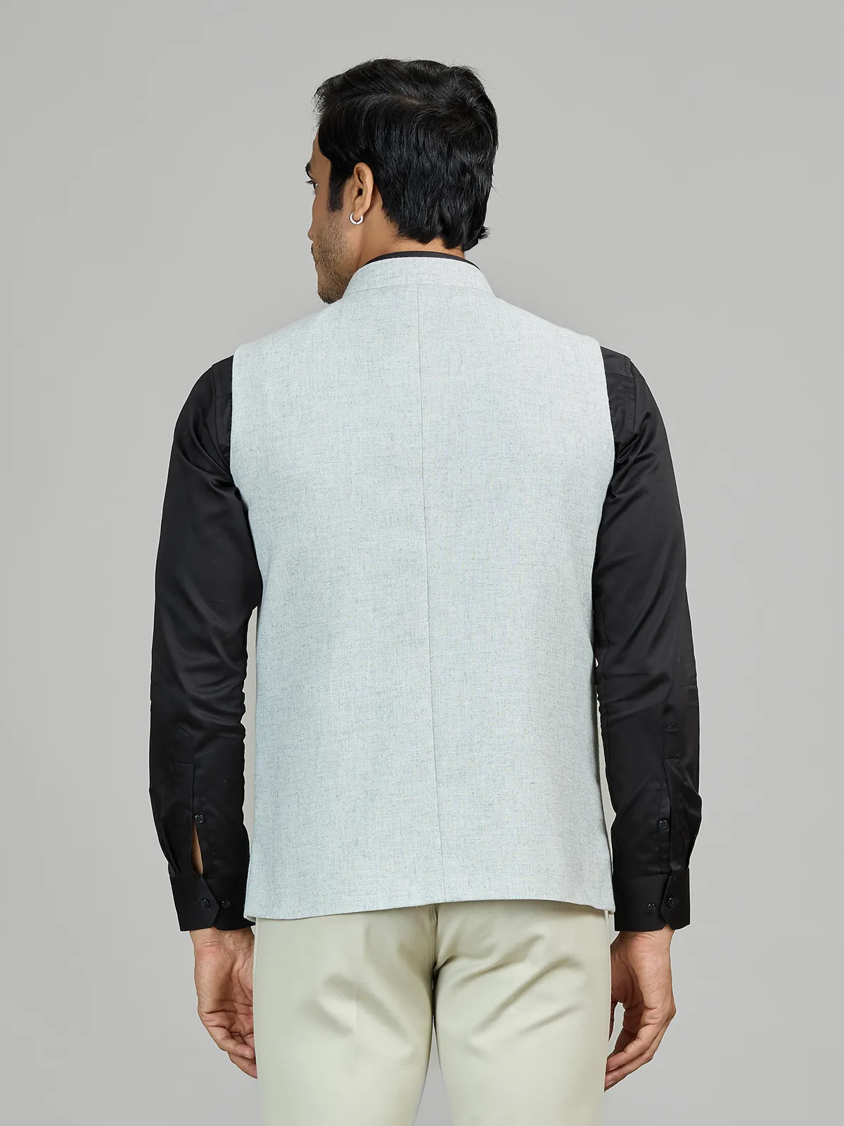 Mint blue linen wedding waistcoat with embellished pocket
