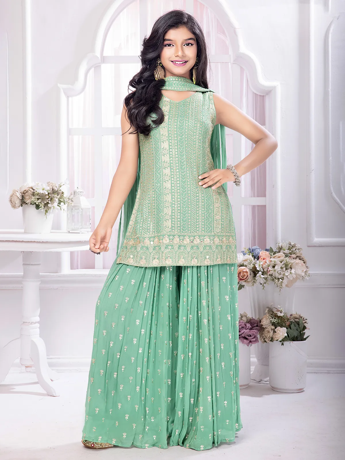 Mint green georgette palazzo salwar suit
