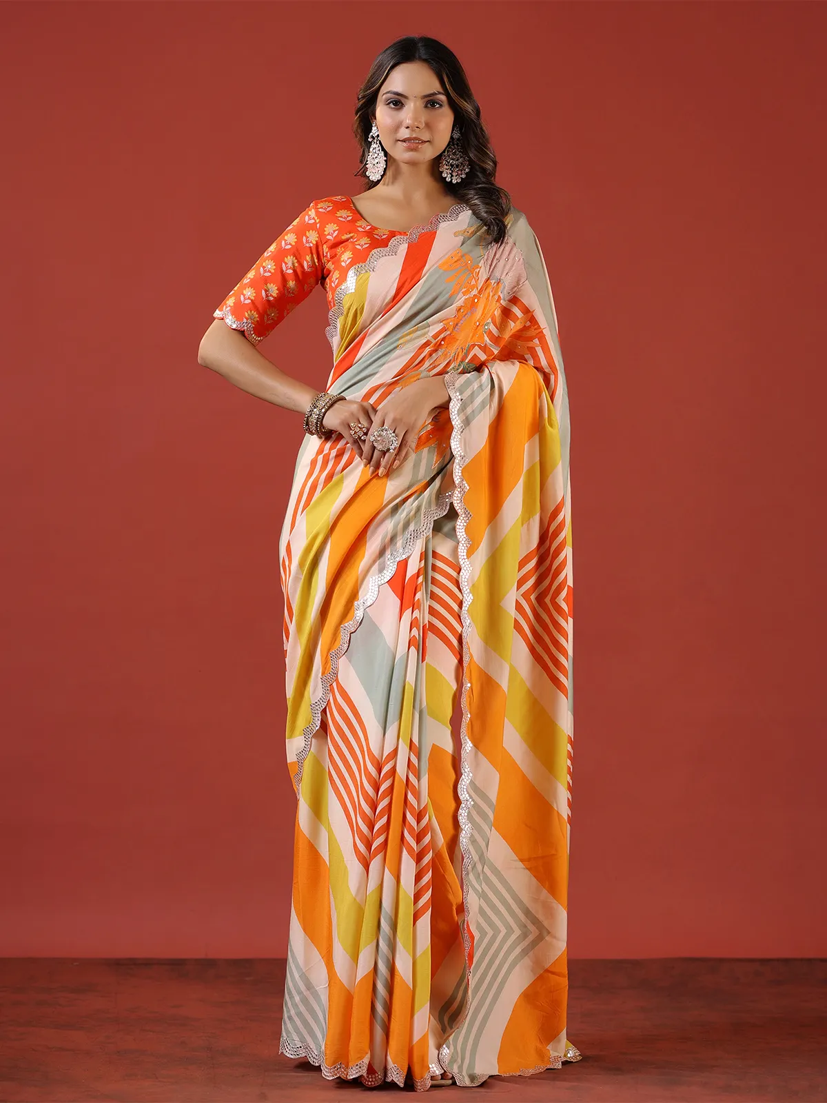 Muslin printed saree in orange