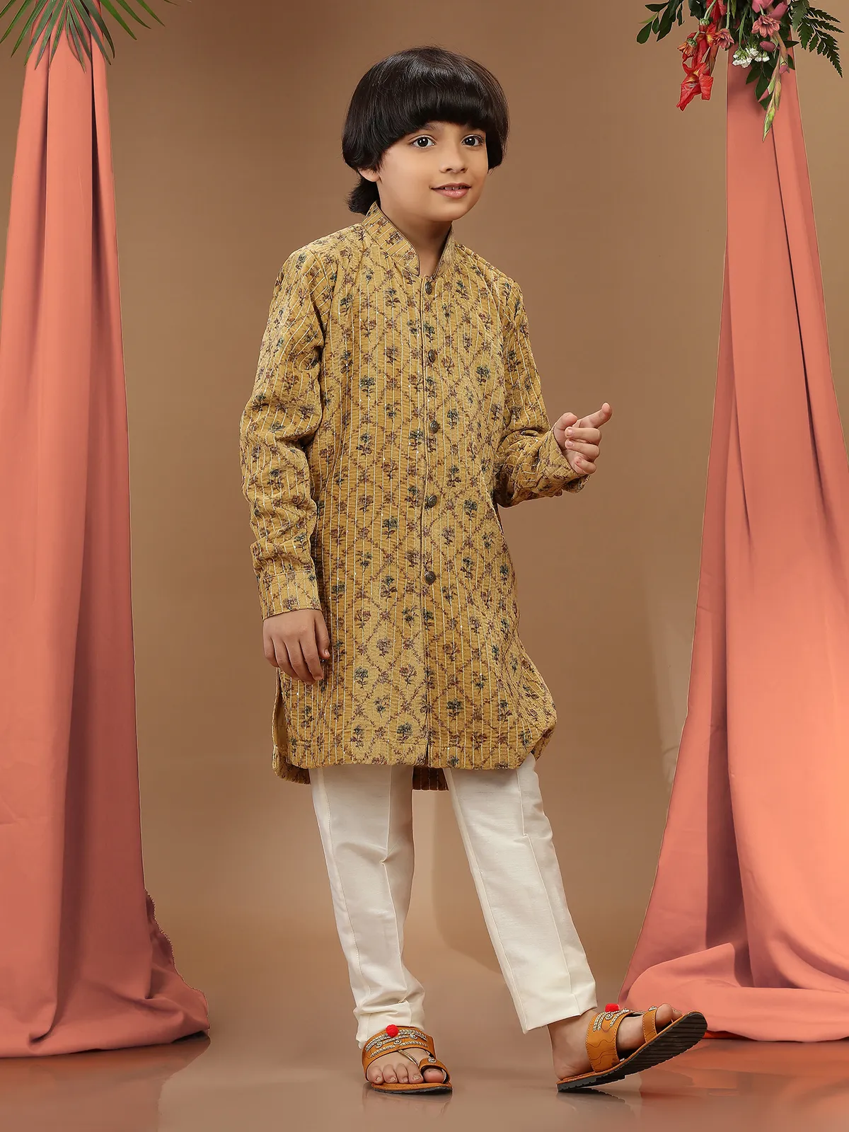 Mustard yellow printed velvet kurta suit for festive