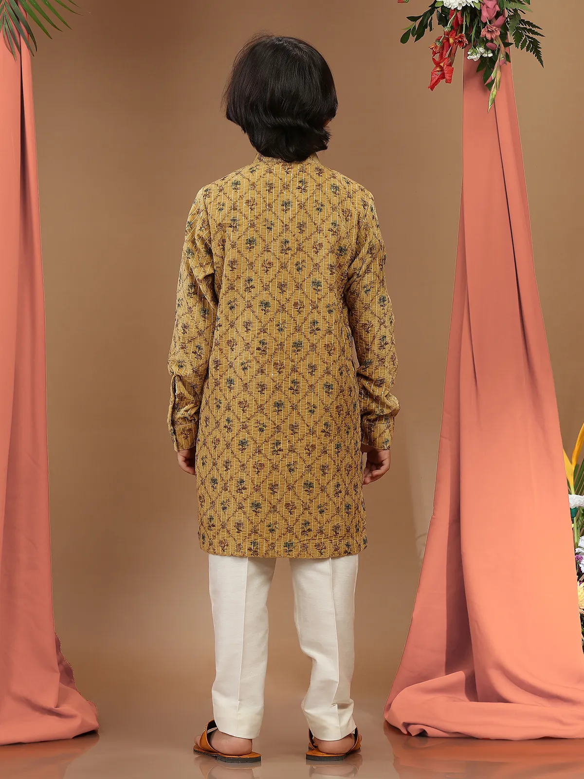 Mustard yellow printed velvet kurta suit for festive