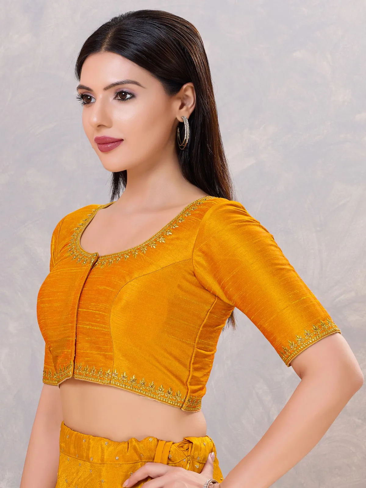 Mustard yellow silk resham and stone work blouse