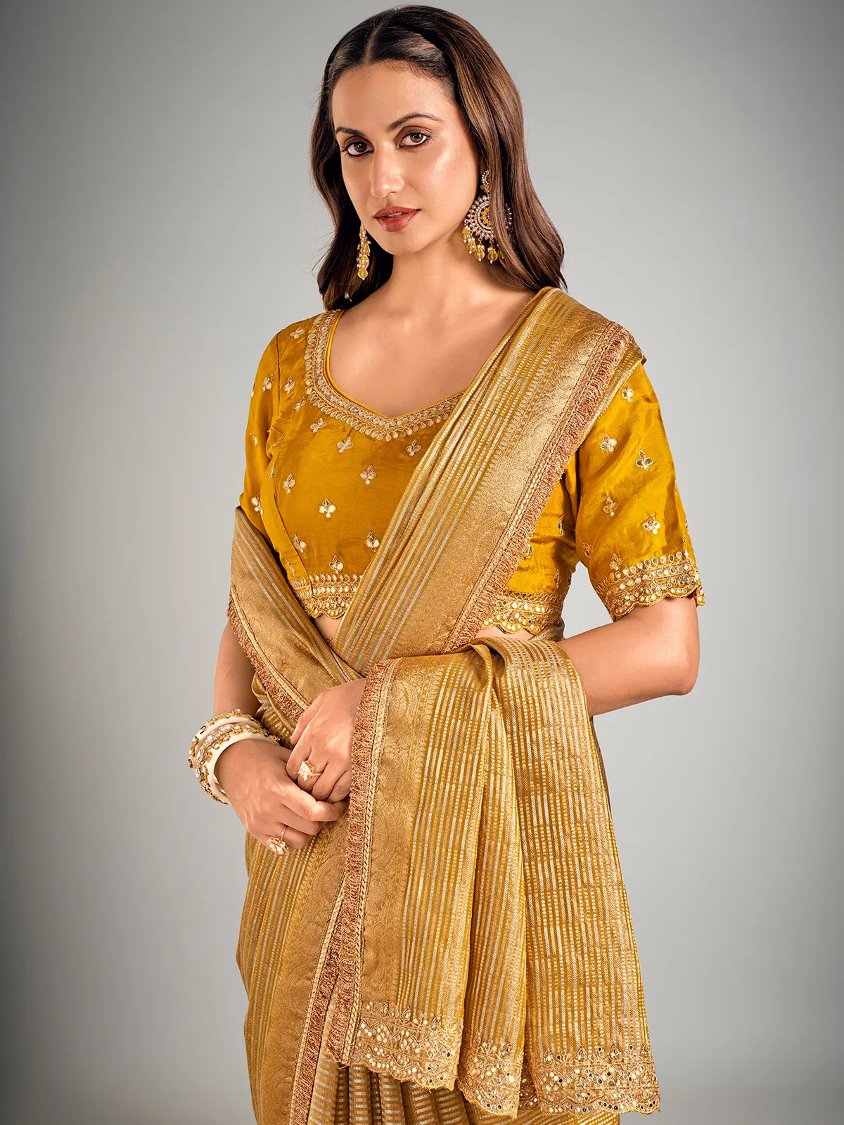 Mustard yellow tissue silk zari weaving saree