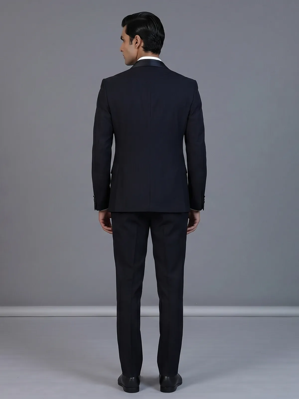 Navy blue designer double breasted suit with satin peak lapel finish