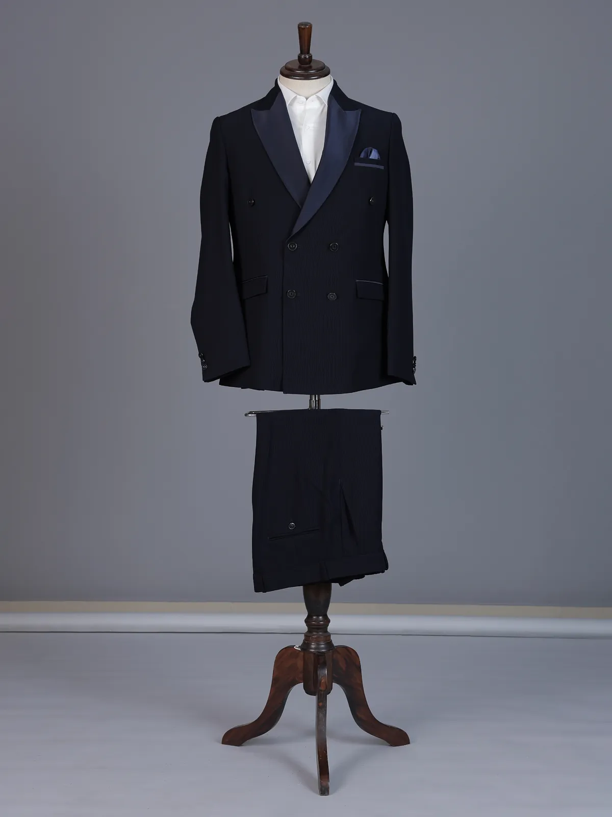 Navy blue designer double breasted suit with satin peak lapel finish