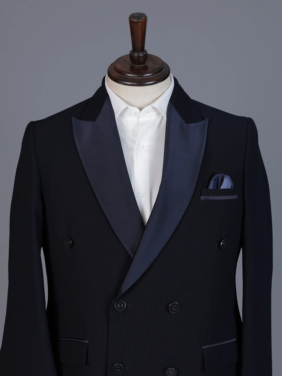 Navy blue designer double breasted suit with satin peak lapel finish