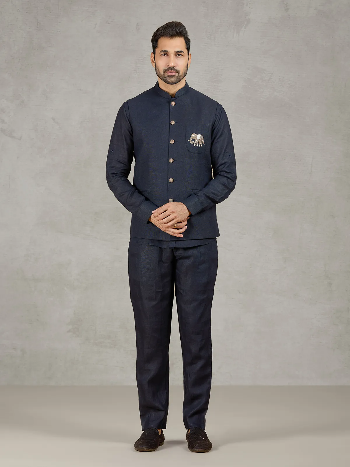 Navy linen waistcoat set with embroidered elephant crest