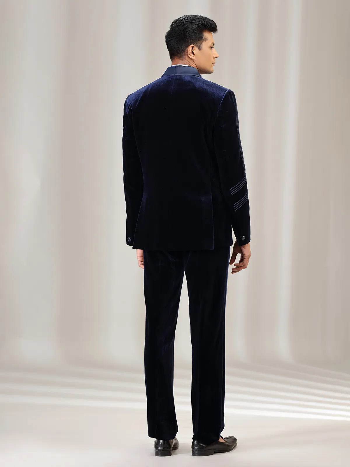 Navy reception wear velvet coat suit with bow tie