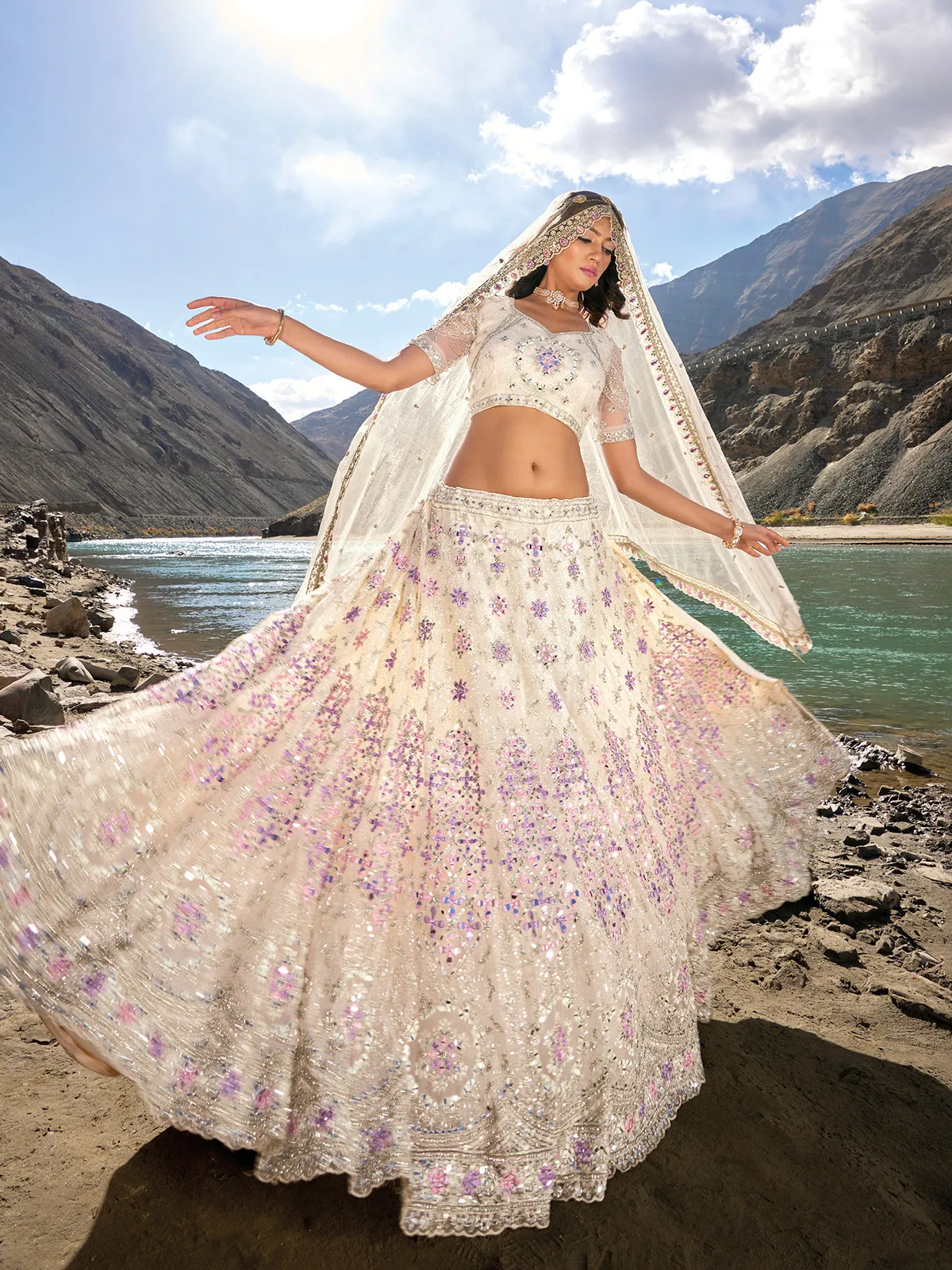 Off white net unstitched lehenga choli