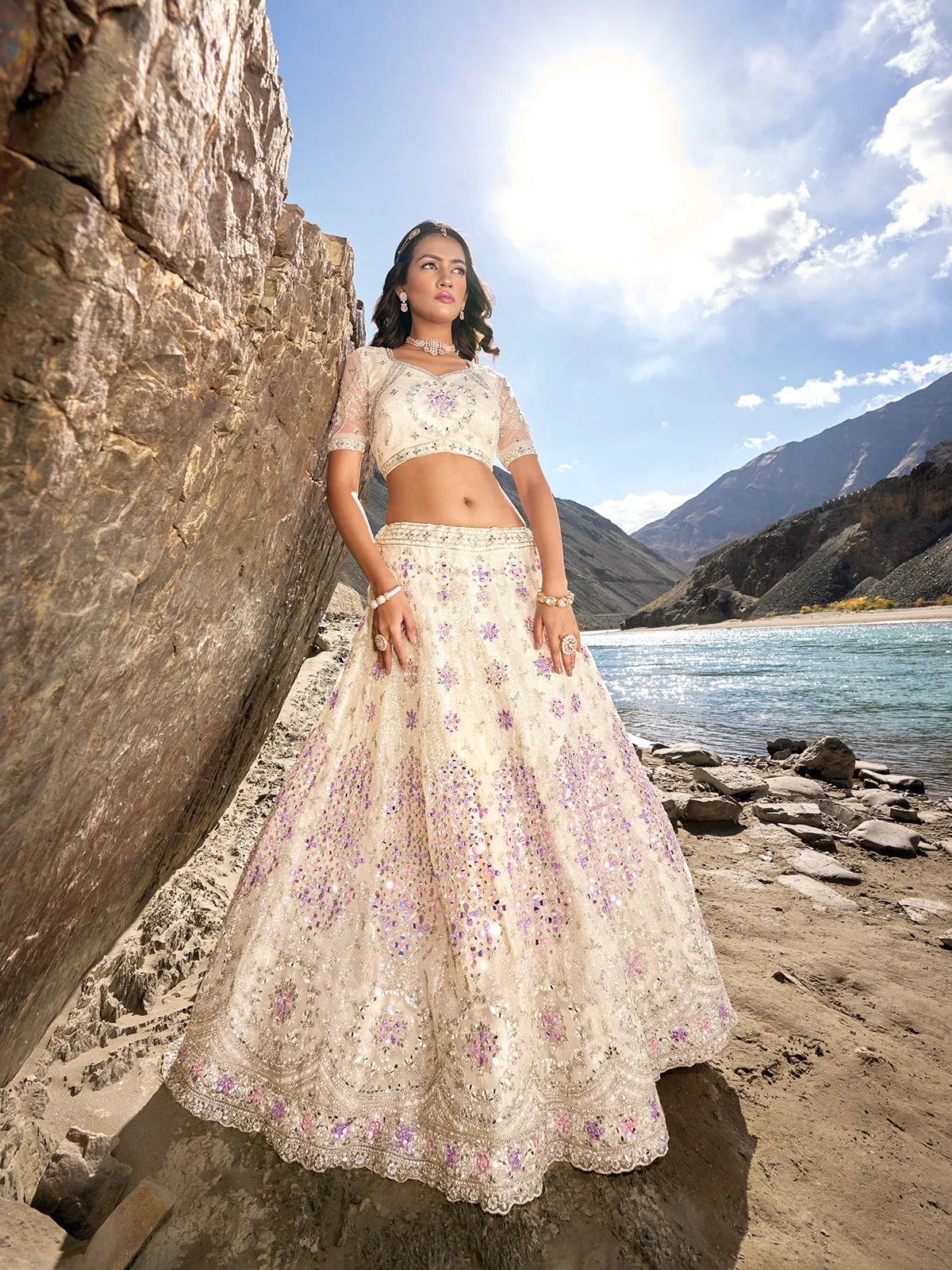 Off white net unstitched lehenga choli