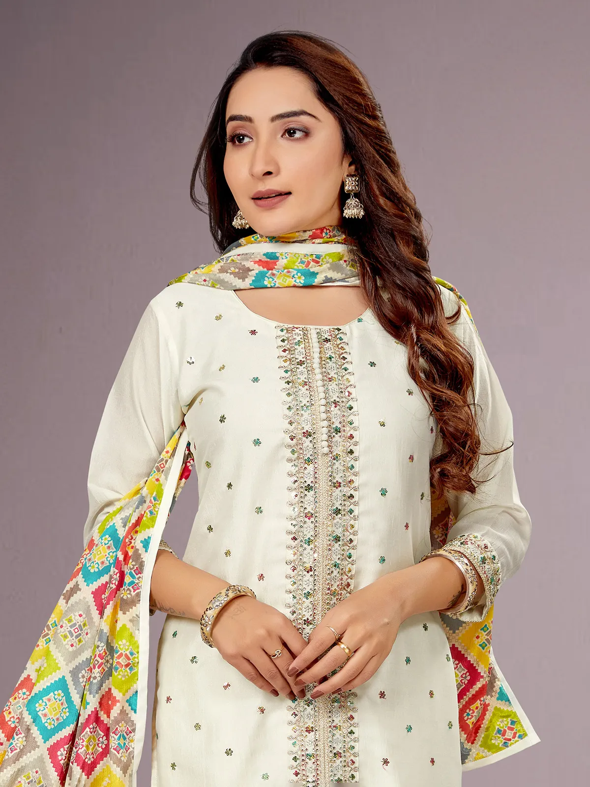 Off-white silk salwar suit with printed dupatta