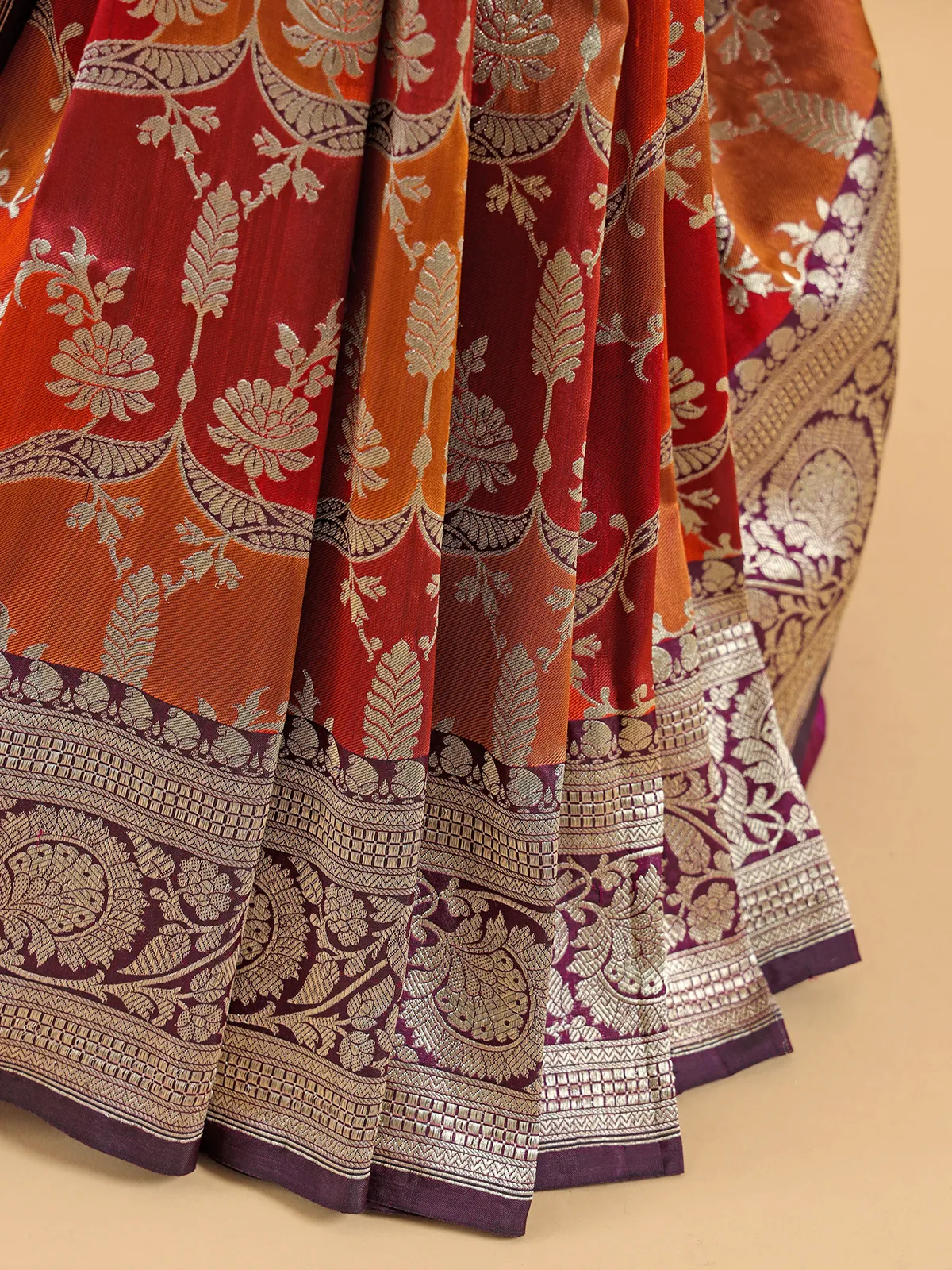 Orange banarasi silk saree with contrast border