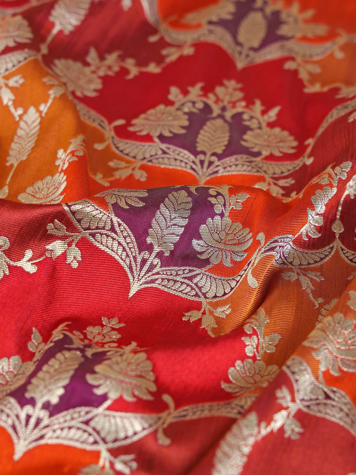 Orange banarasi silk saree with contrast border