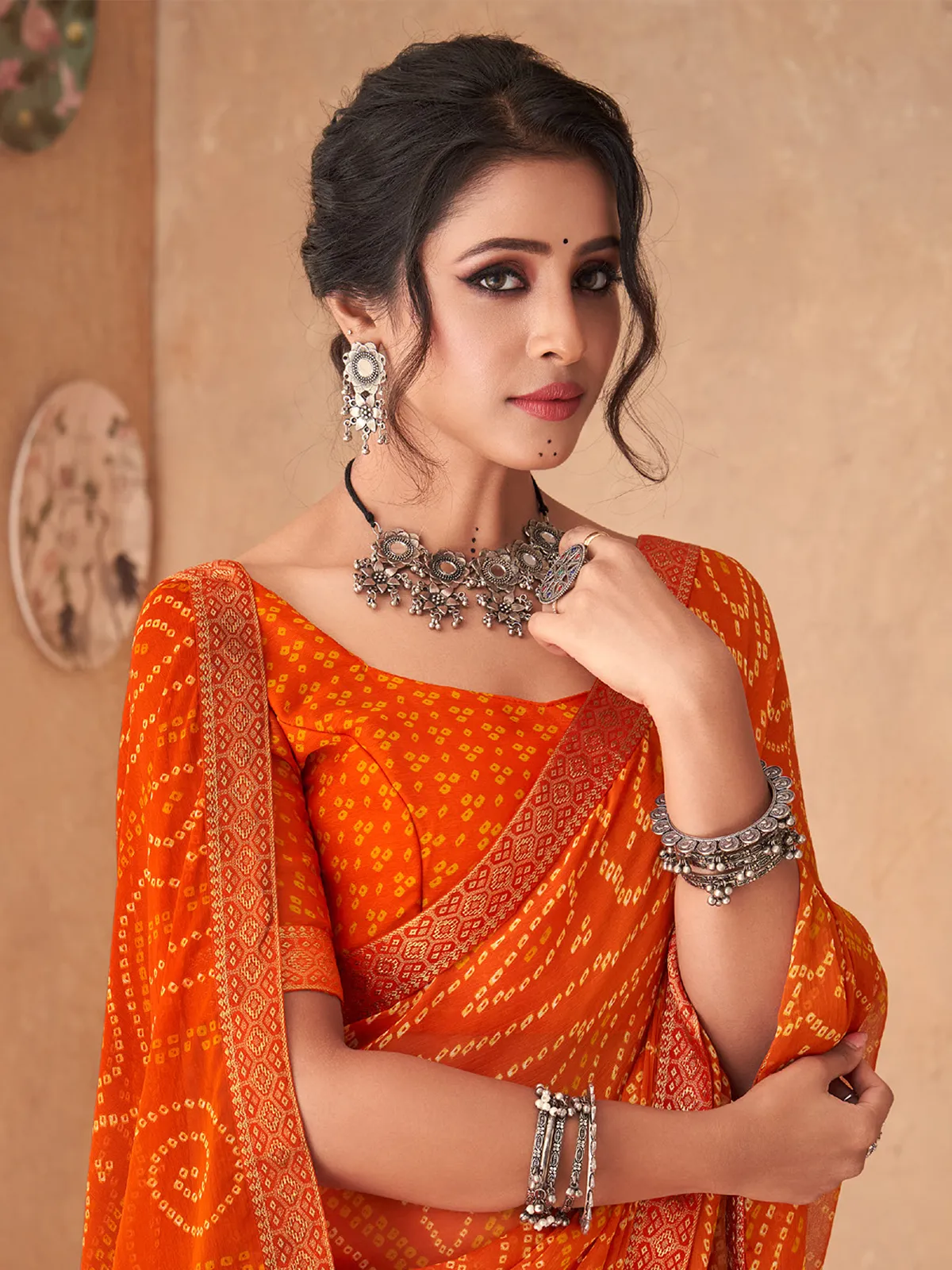 Orange bandhej printed chiffon saree