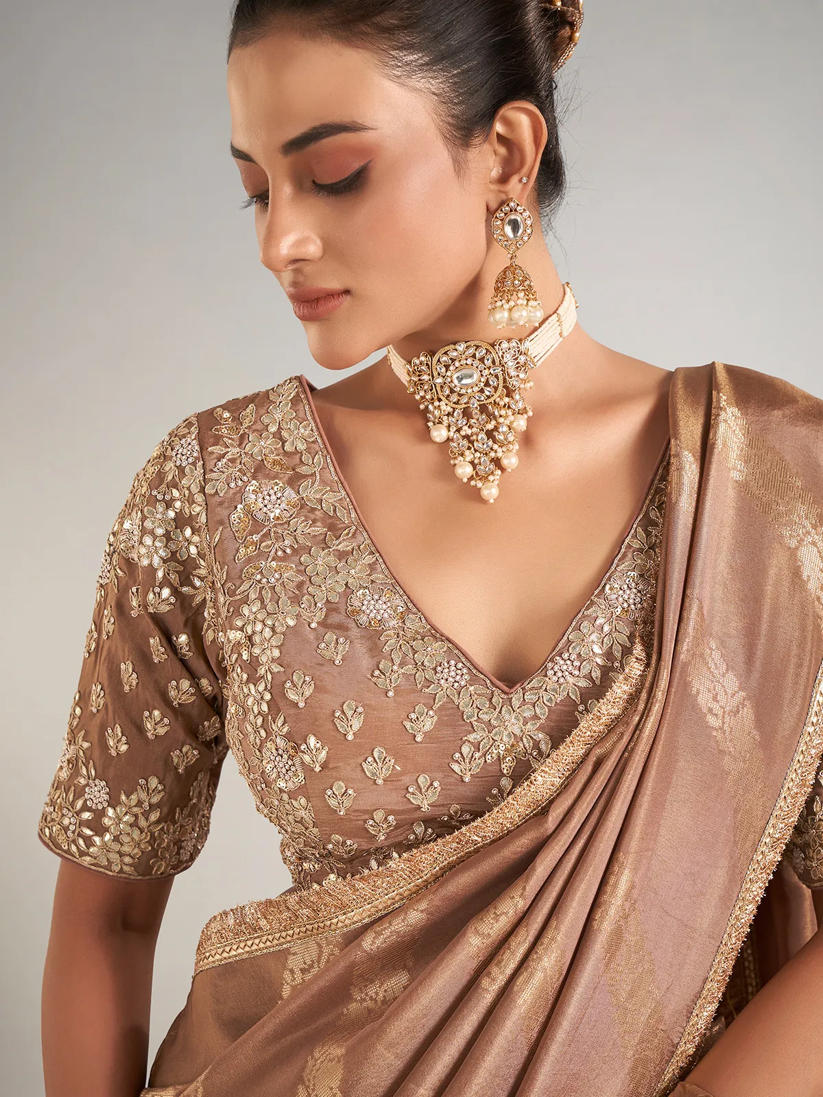 Pastel brown shimmer dola silk wedding saree