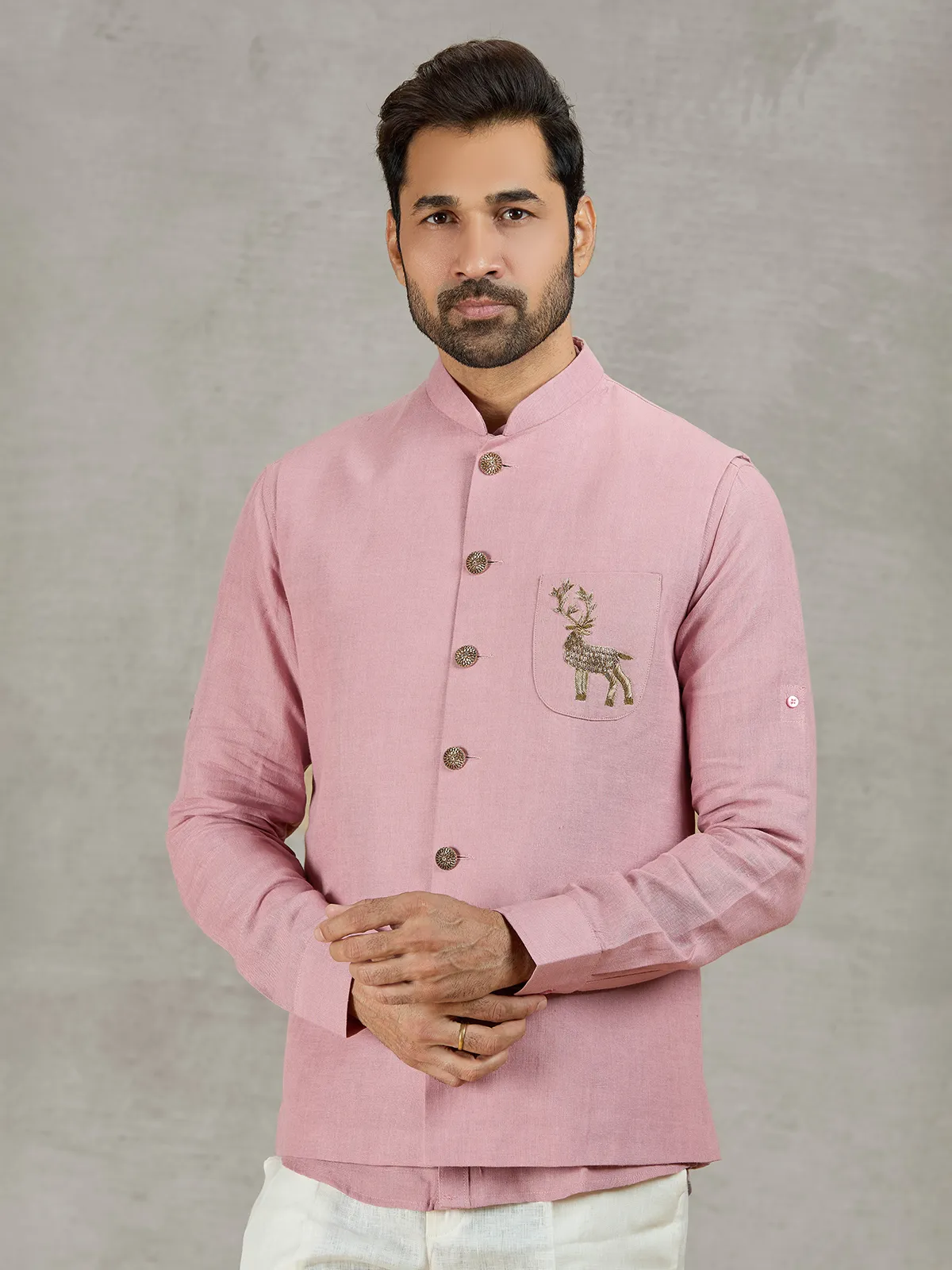 Pastel pink linen waistcoat with shirt and embellished crest detail