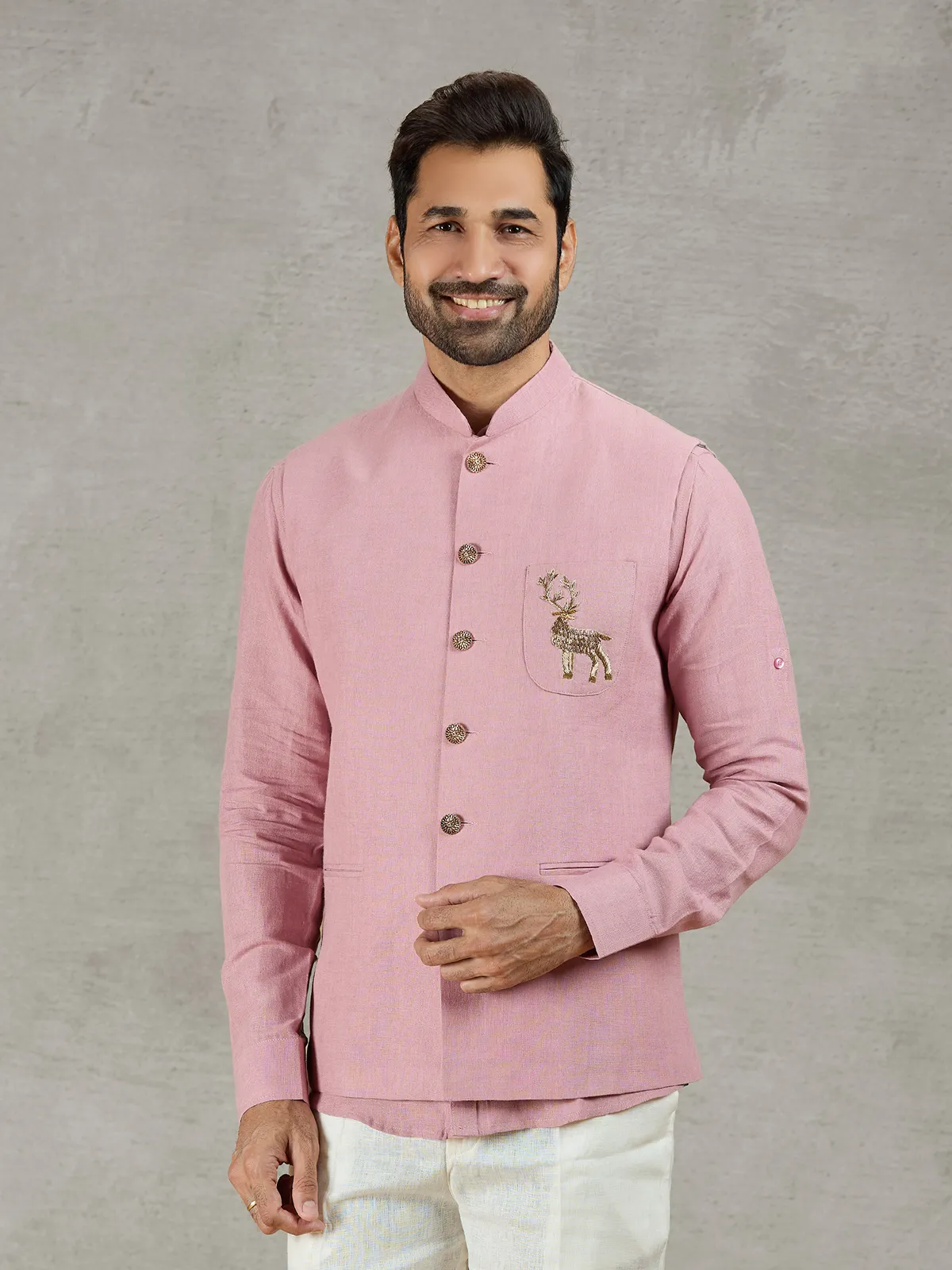 Pastel pink linen waistcoat with shirt and embellished crest detail
