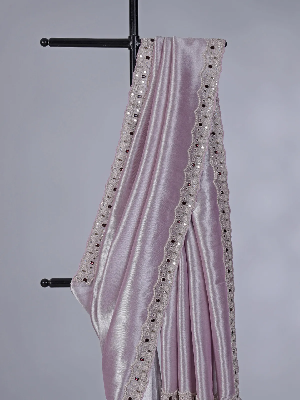 Pastel purple tissue silk saree with stone highlights