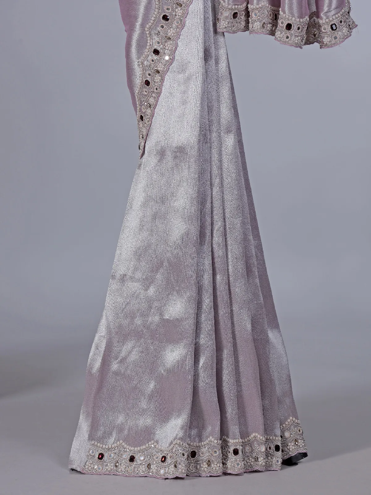 Pastel purple tissue silk saree with stone highlights