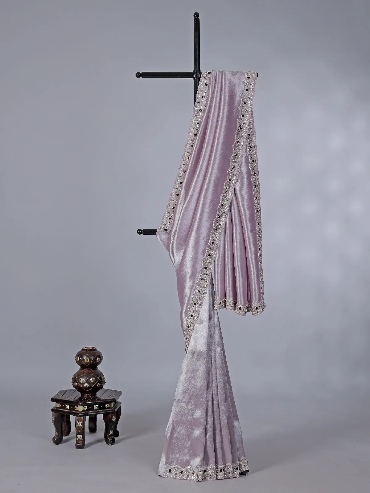 Pastel purple tissue silk saree with stone highlights