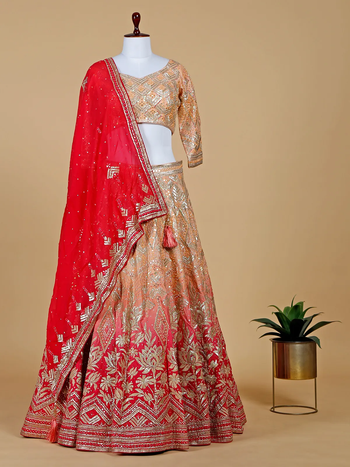 Peach and red shaded lehenga choli