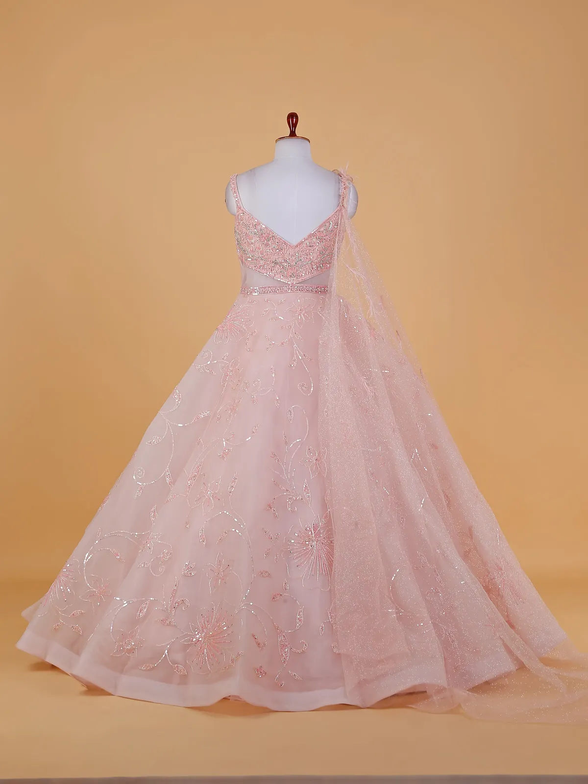 Peach designer net gown