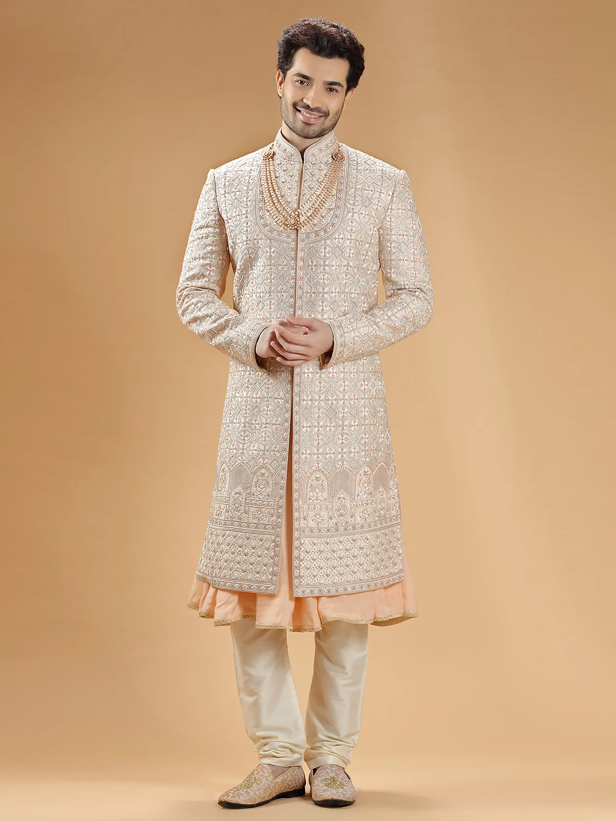 Peach lavish groom sherwani in raw silk