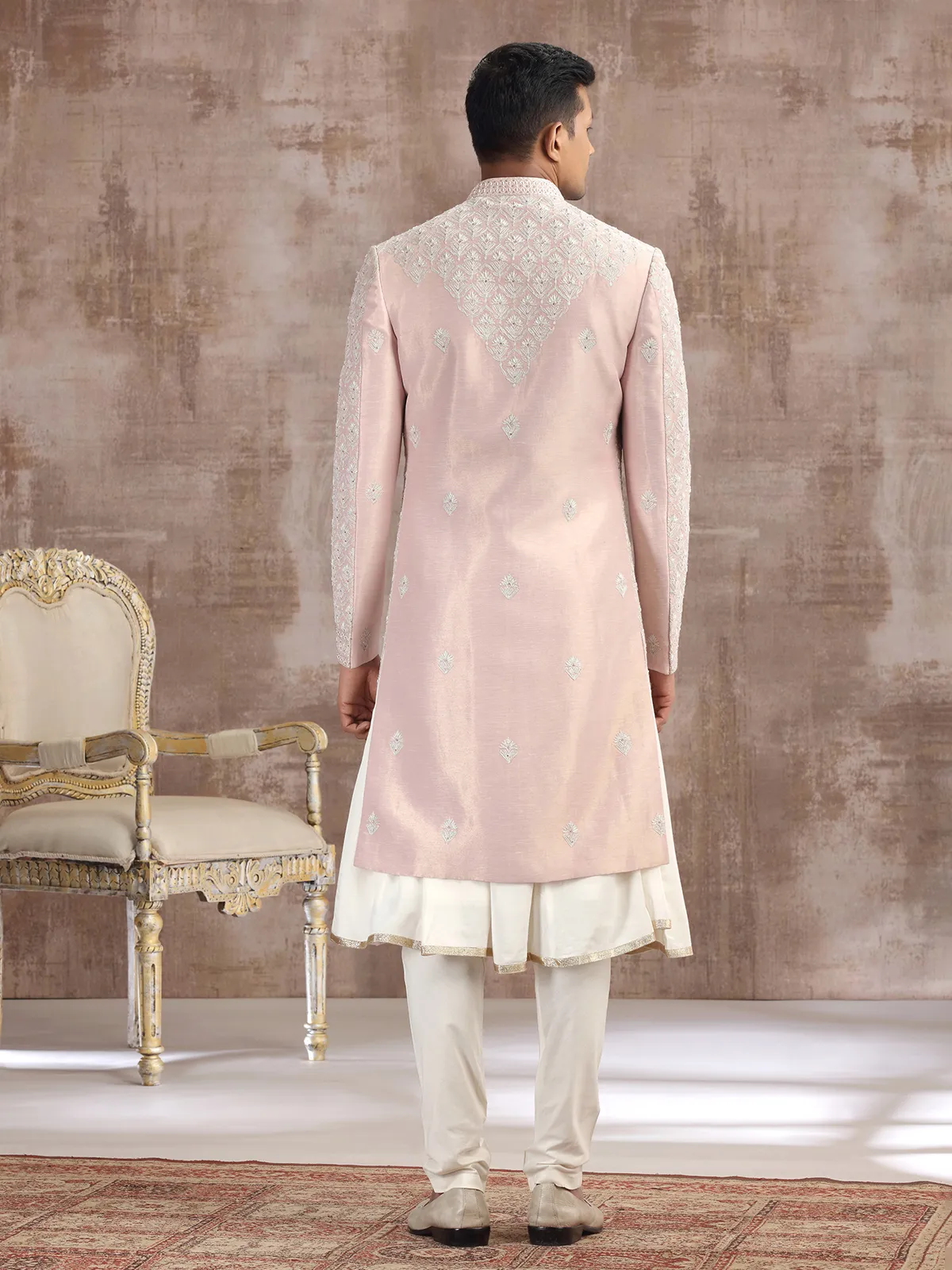 Peach silk peshwai sherwani with graceful accents