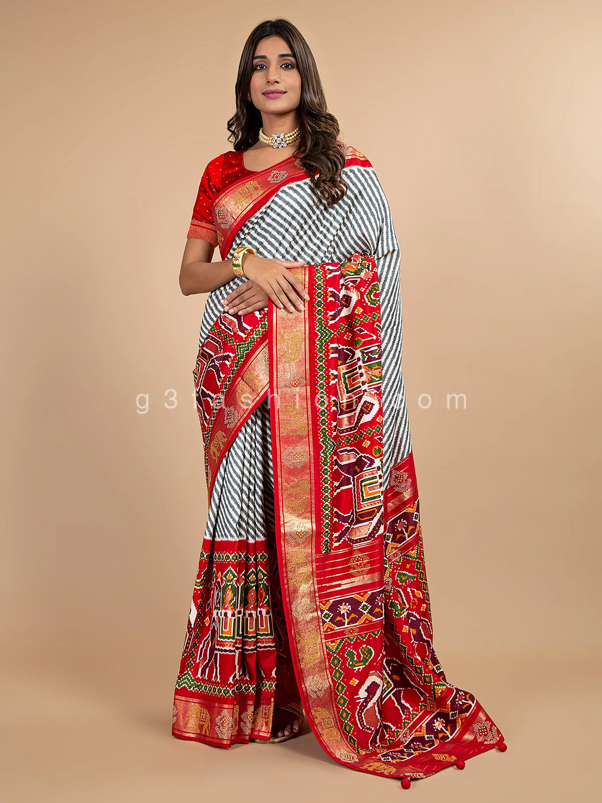 Pearl white patola silk wedding occasions saree