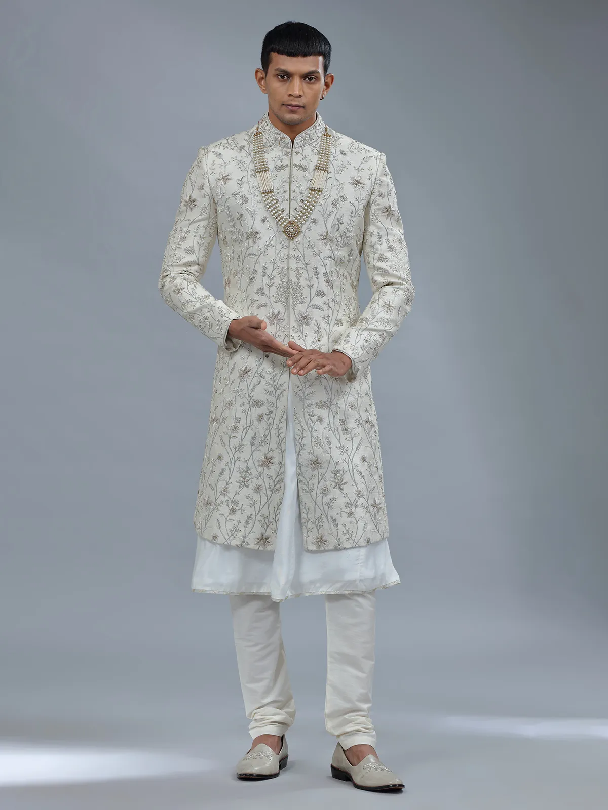 Peshwai style off white raw silk shewani for groom