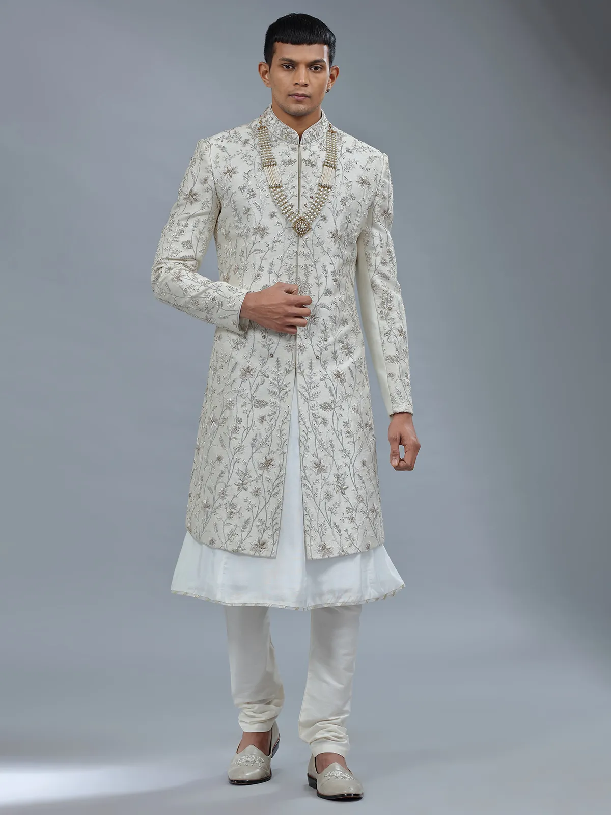 Peshwai style off white raw silk shewani for groom