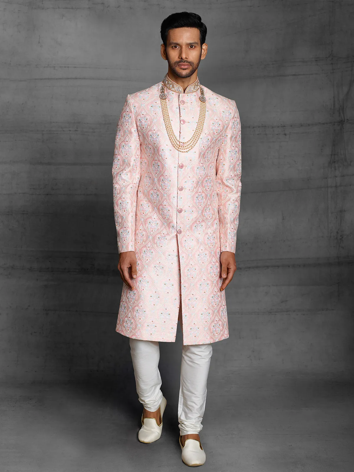 Pink hue silk fabric wedding wear sherwani for mens