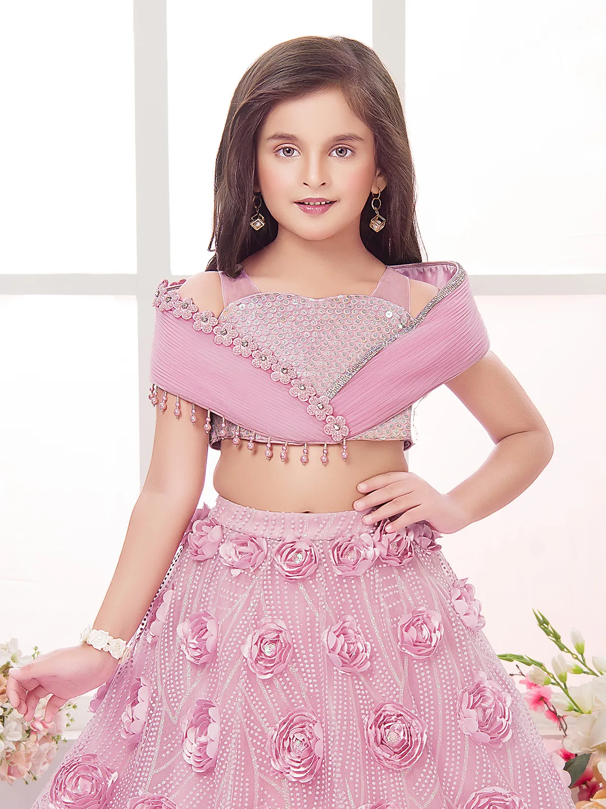 Pink net designer patch work embellished lehenga choli