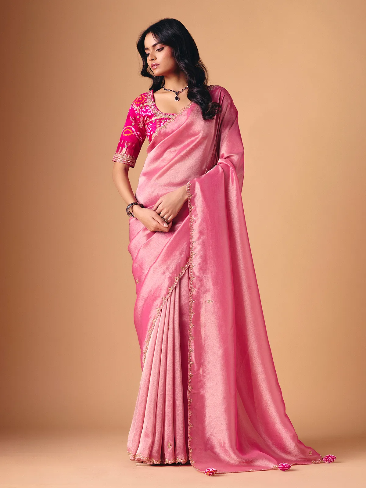 Pink tissue silk designer saree for reception